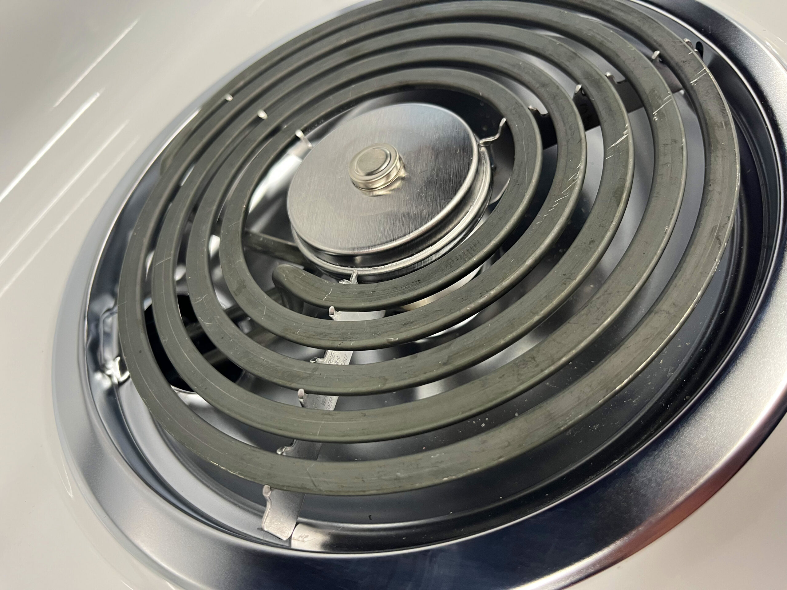 Les petites “cloches” sur les éléments de cuisinière à serpentin: à quoi servent-elles et quand les remplacer?